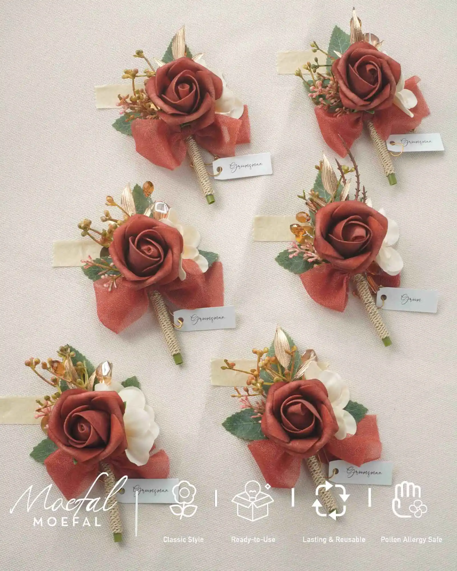 A set of six terracotta boutonnieres for the groom and groomsmen laid out.