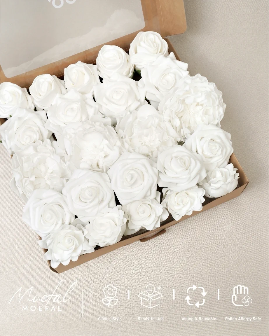 An open cardboard box viewed from above, filled with white peonies and roses heads.